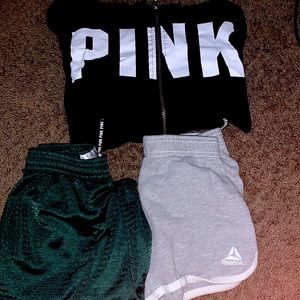 One Pink Black Sweater Two pairs of stretched shorts one green one grey